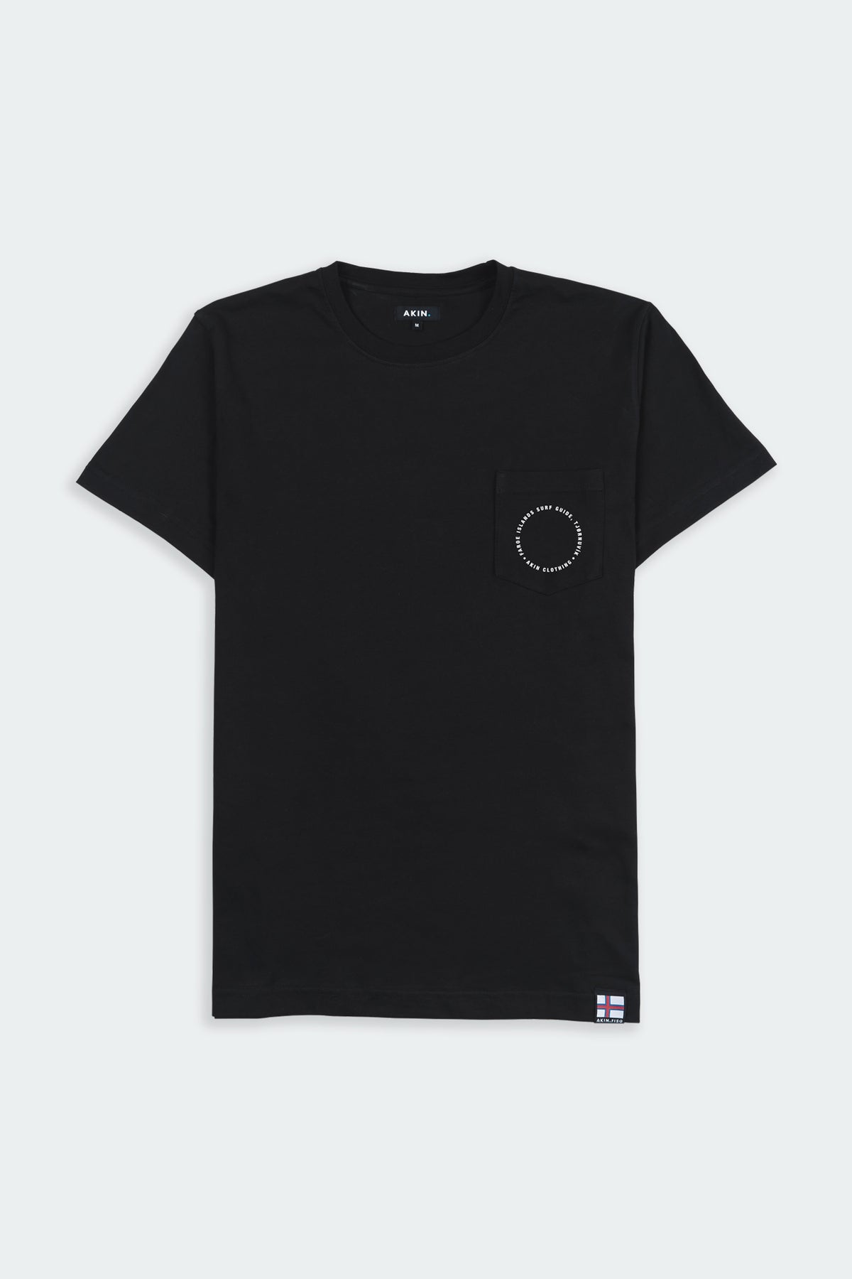 Black Faroe Islands Surf Guide x Akin pocket t-shirt, front view with circular chest graphic