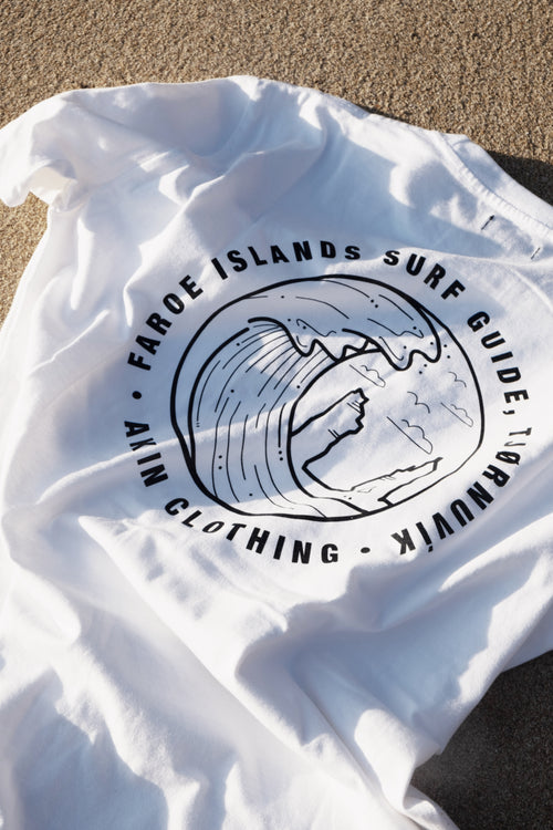 Close-up of back graphic on white Faroe Islands Surf Guide x Akin t-shirt, circular wave print